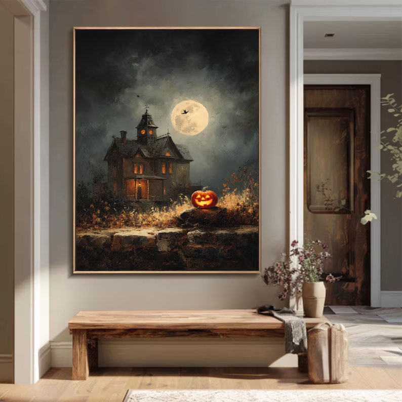 Gothic Halloween canvas wall art featuring a haunted house, glowing jack-o’-lantern, full moon, and bats in night sky — spooky elegant decor.